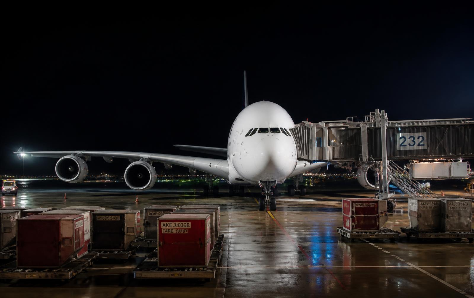 Airport cargo operation at dusk for transportation of mortal remains by air